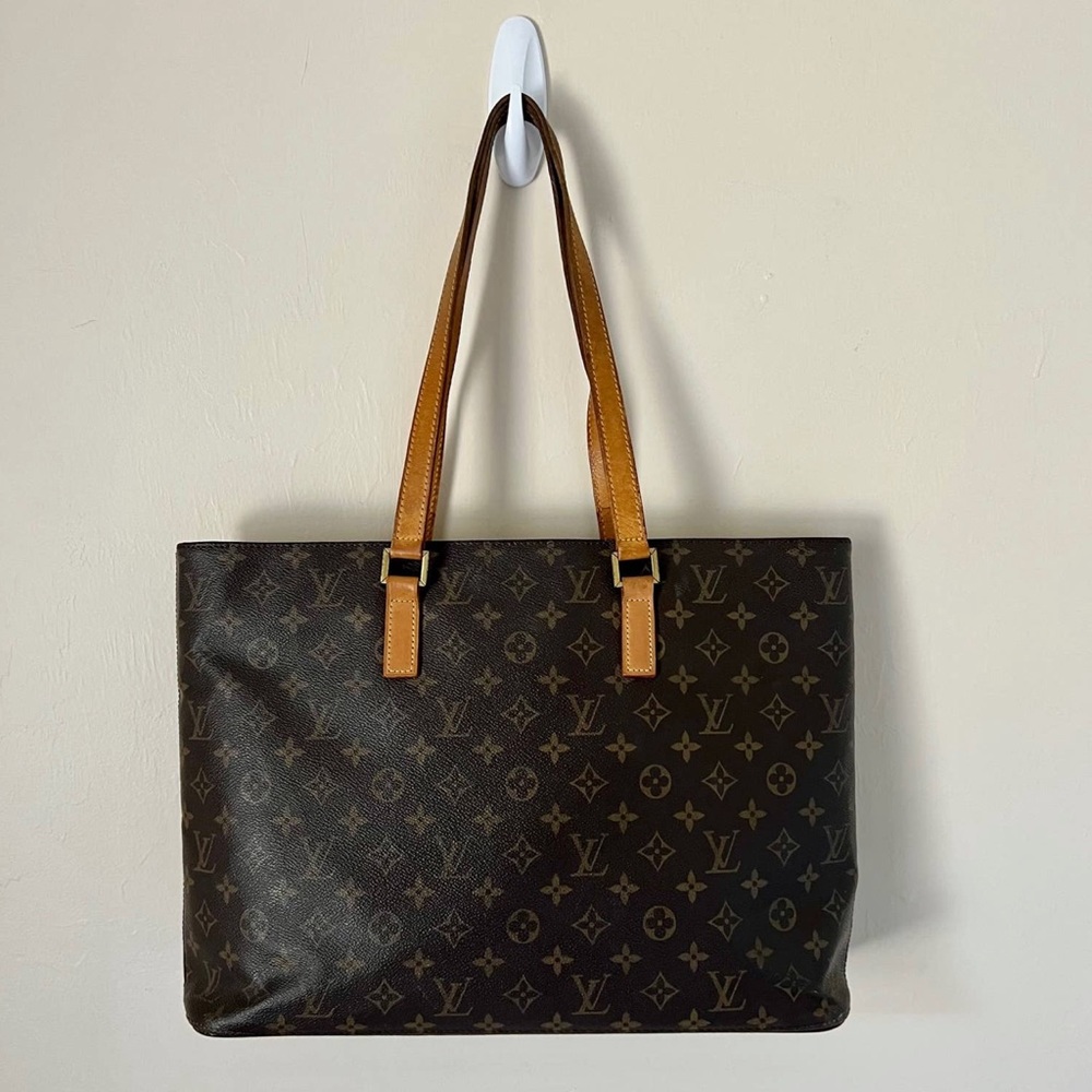 One strap is broken at ring but can be sewn back. Canvas mint condition.